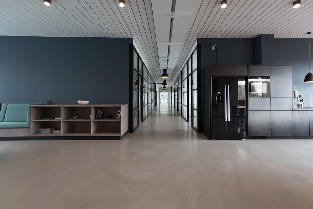 Modern open-plan office with seamless wireless network connectivity managed by KTS